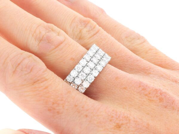 three row diamond eternity ring on finger