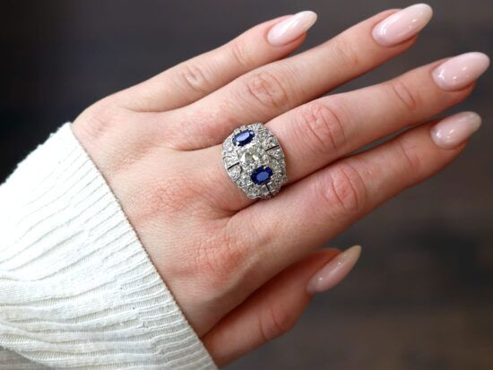 wearing art deco basaltic sapphire cocktail ring