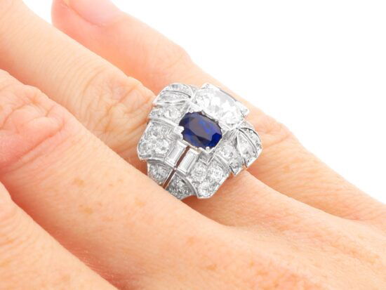 platinum basaltic sapphire cocktail ring on finger