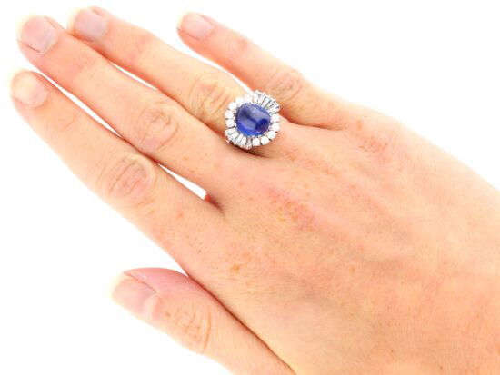 white gold Burmese sapphire ring on hand