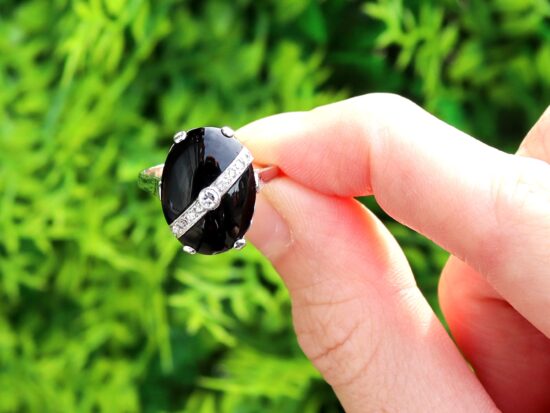 Antique Black Onyx and Diamond Ring in White Gold outside