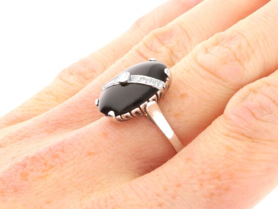Antique Black Onyx and Diamond Ring in White Gold on hand