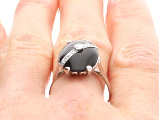 Antique Black Onyx and Diamond Ring in White Gold on finger