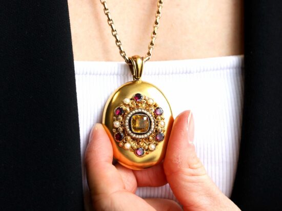 wearing citrine pearl garnet locket