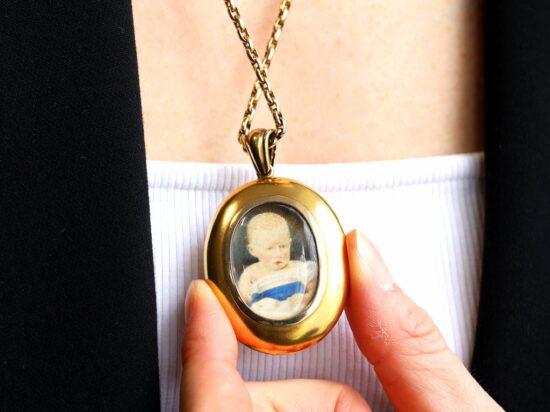 gold locket wearing
