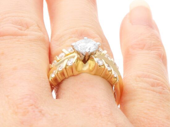 Wedding and Engagement Ring Set Gold on finger