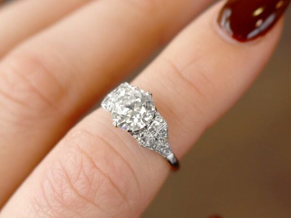 old European cut diamond ring on finger