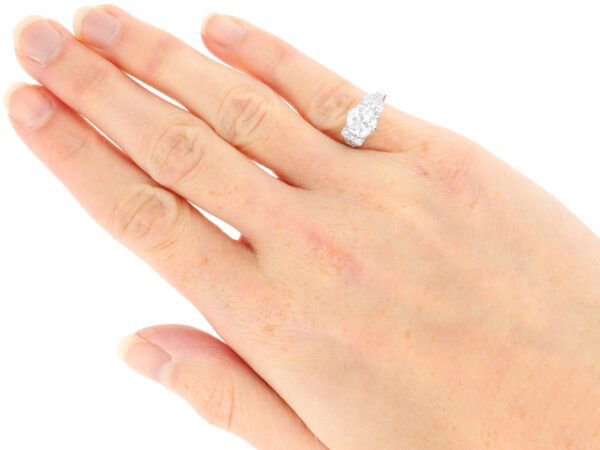 old European cut diamond solitaire ring on hand