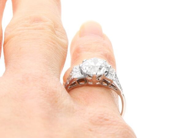 wearing old European cut diamond solitaire ring