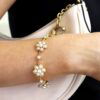 wearing Victorian pearl and 18k gold bracelet