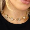 wearing Victorian pearl and gold necklace