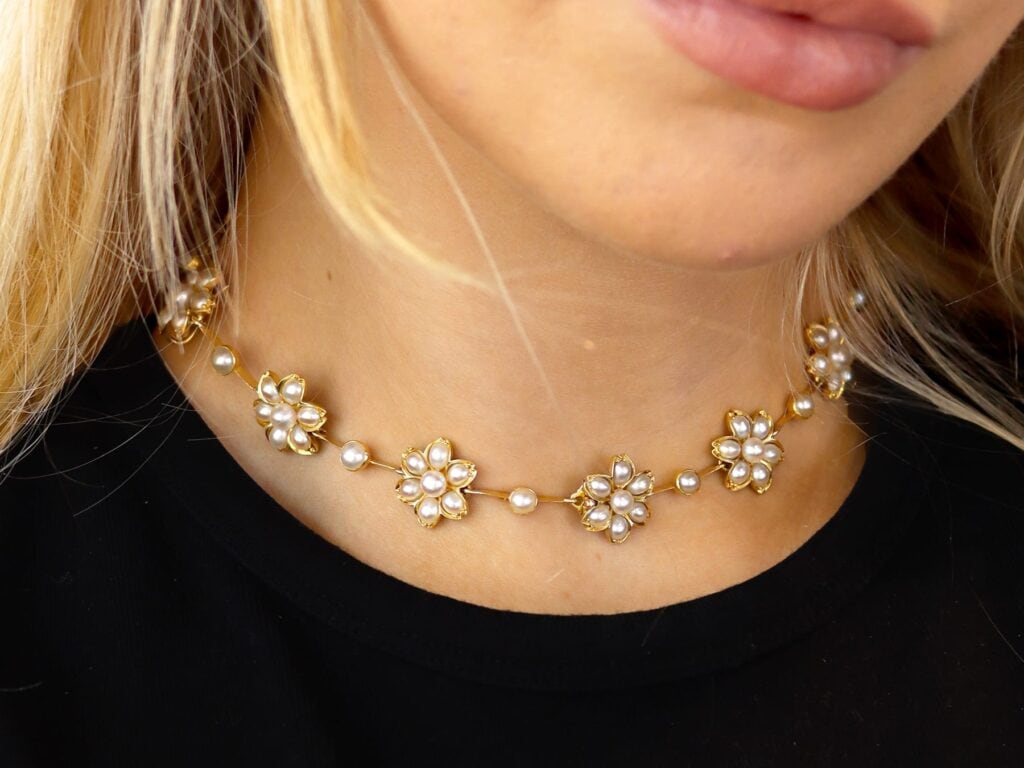 wearing Victorian pearl and gold necklace