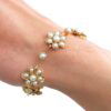 wearing Victorian pearl and gold bracelet