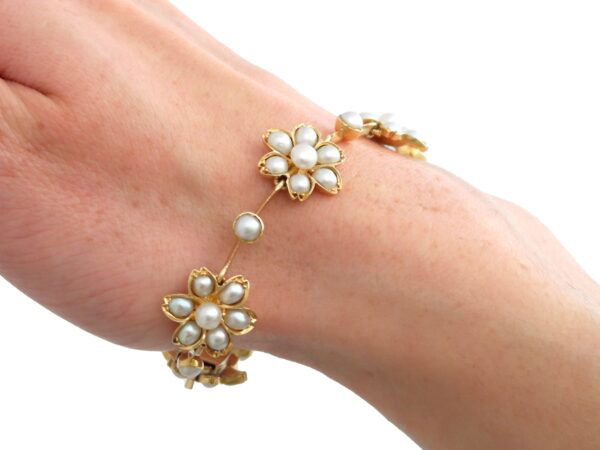 wearing Victorian pearl and gold bracelet