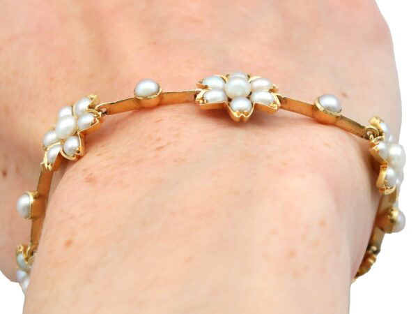 Victorian pearl and gold bracelet on arm