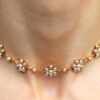 Victorian pearl and gold necklace on neck