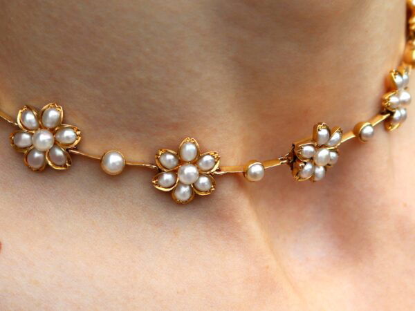 wearing Victorian pearl and gold necklace