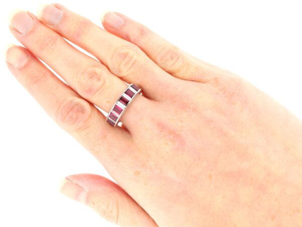 vintage ruby and diamond eternity ring on hand