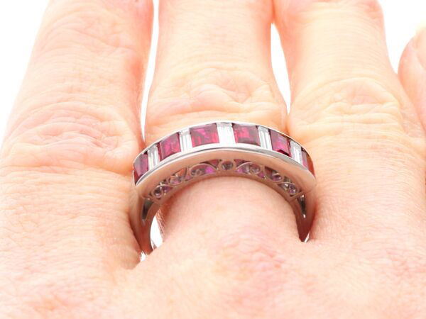 vintage ruby and diamond eternity ring on finger