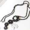 black diamond and pearl drop pendant