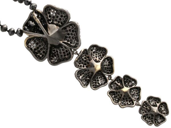 reverse of black diamond and pearl pendant
