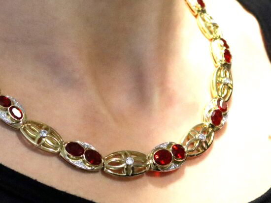 Fire Opal Necklace Being Worn Close Up