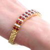 wearing ruby and diamond bracelet on wrist