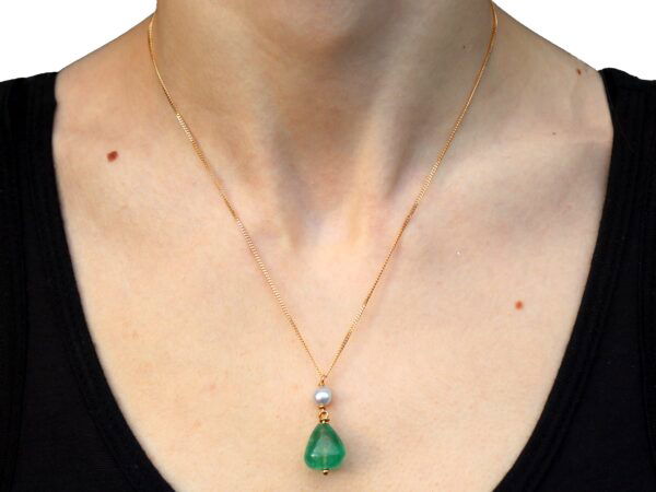 GIA certified emerald pendant with pearl on neck
