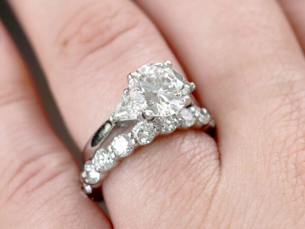 diamond rings stacked on finger