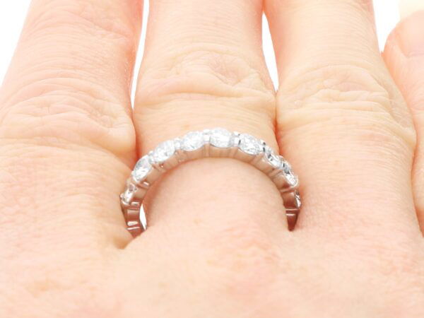 2.38 Carat Diamond Eternity Ring in 18k White Gold on finger
