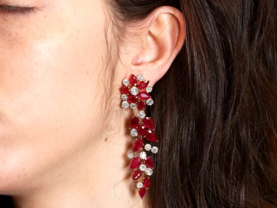 Yellow Gold Earrings Being Worn