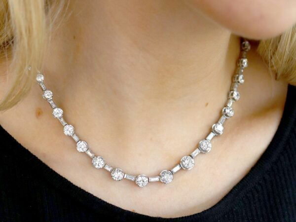 wearing a Art Deco Baguette and Round Cut Diamond Necklace