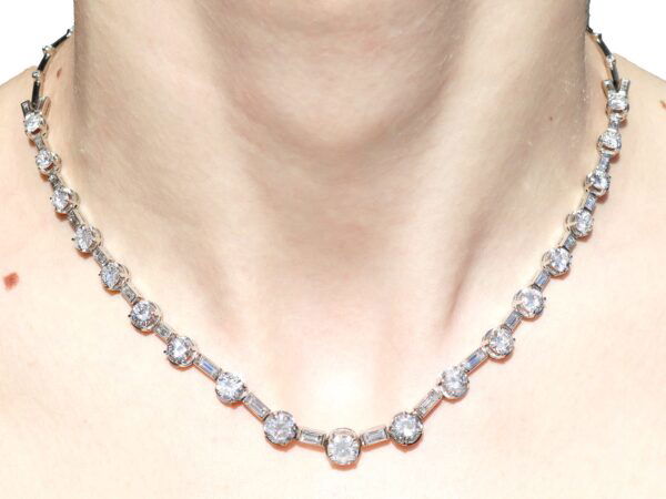 wearing a Art Deco Baguette and Round Cut Diamond Necklace