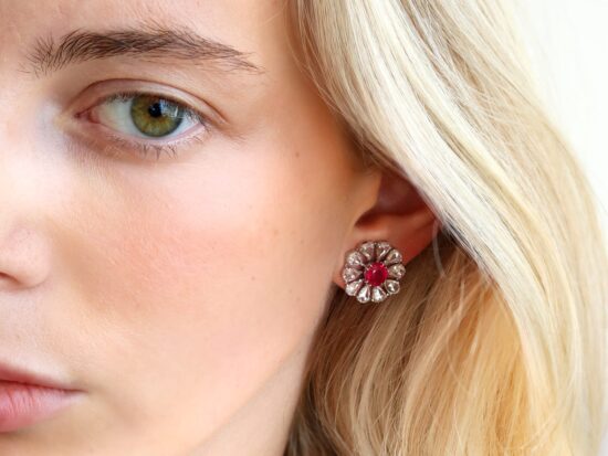Ruby Diamond Earrings Being Worn