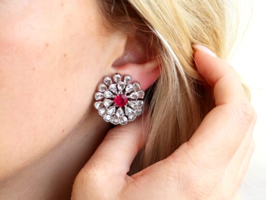 Ruby Earrings In Ear Closeup