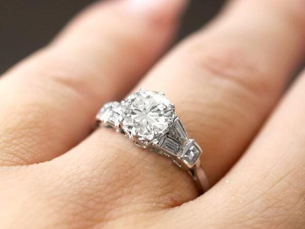 wearing Art Deco Diamond Solitaire Ring in Platinum