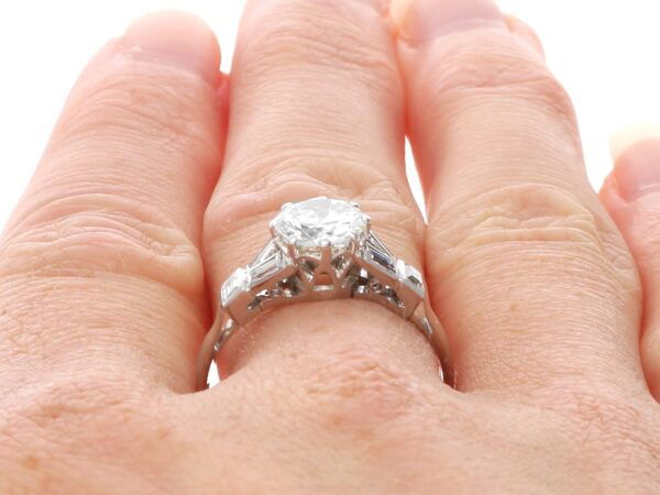 wearing platinum Art Deco diamond ring