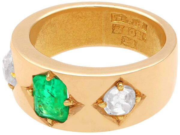 gold band with emerald and diamonds
