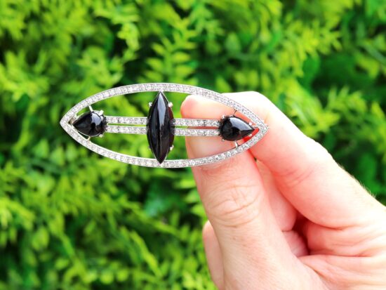Navette Onyx and Diamond Brooch with Diamonds outside