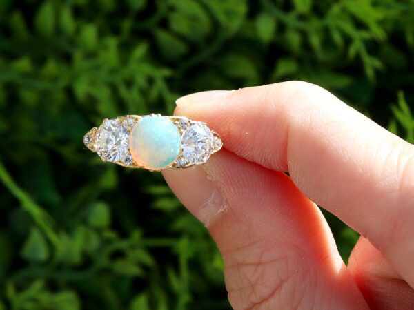 gold opal and diamond trilogy ring