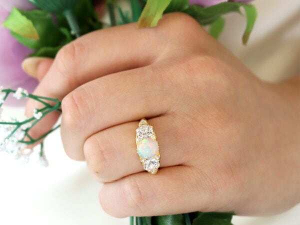 yellow gold opal and diamond trilogy ring