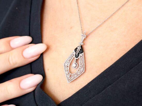 Black Onyx and Diamond Pendant in Platinum wearing