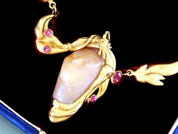 yellow gold carved opal and ruby necklace