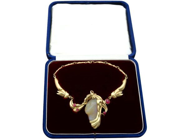 boxed carved opal and ruby necklace