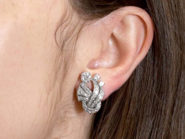 vintage art deco diamond earrings in the ear