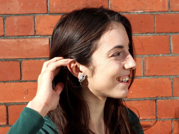 wearing vintage art deco diamond earrings