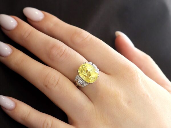 antique yellow sapphire ring with diamonds on hand
