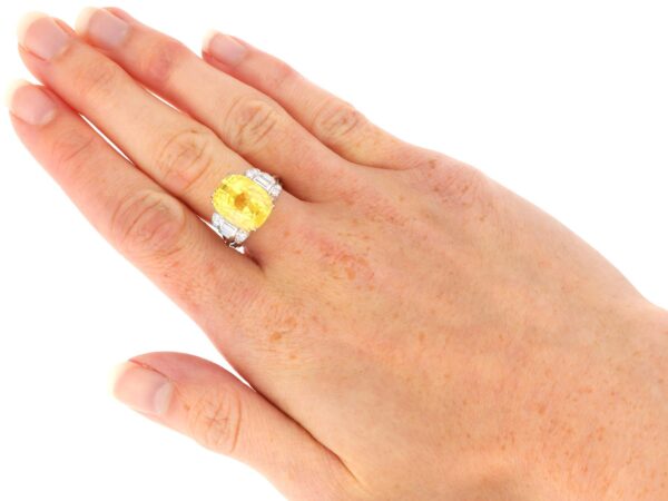 antique yellow sapphire ring on hand