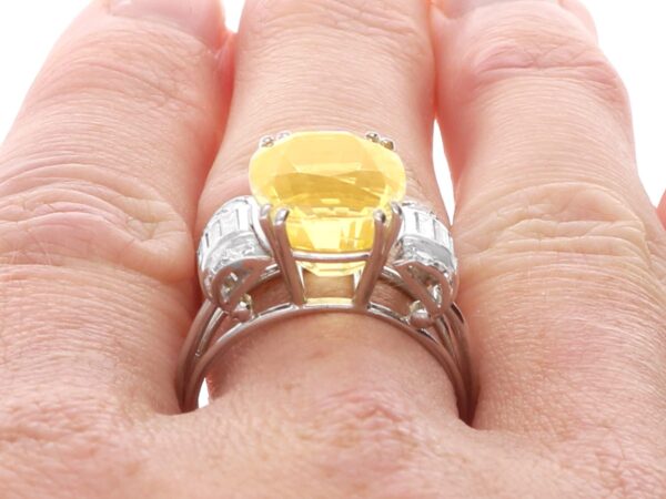 wearing a antique yellow sapphire ring