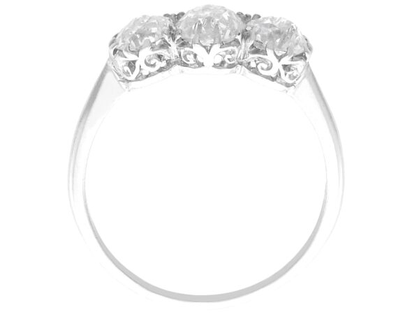three stone diamond ring platinum side view